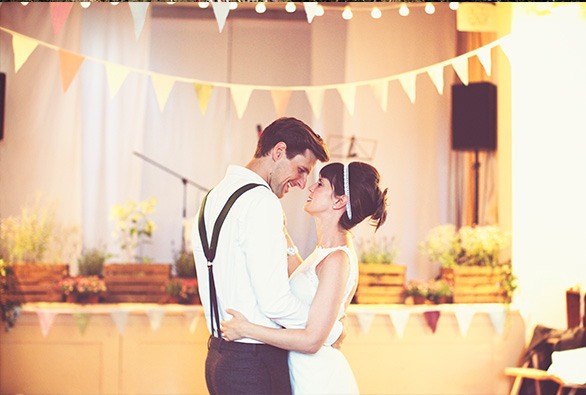 Gemma and Richard had a romantic celebration with festival flourishes such as acres of bunting. Photo: On Love and Photography
